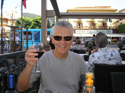 Bob McAfee holding a wineglass
